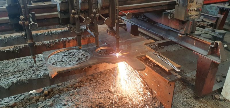 Flame cutter in action cutting some 22mm rings. Flame cutter in action cutting some 22mm rings.: Swipe To View More Images
